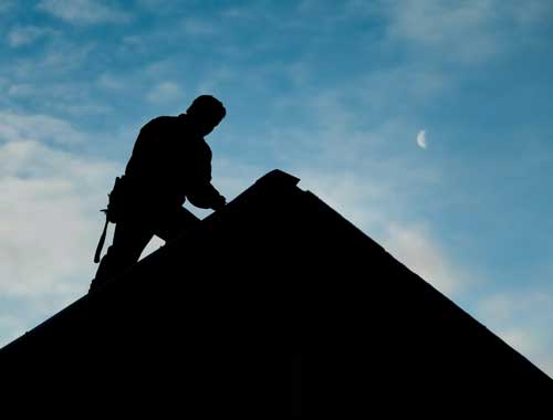 Man working on a roof